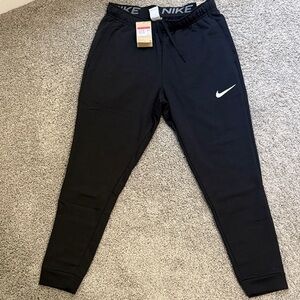 Nike Black joggers with White Logo